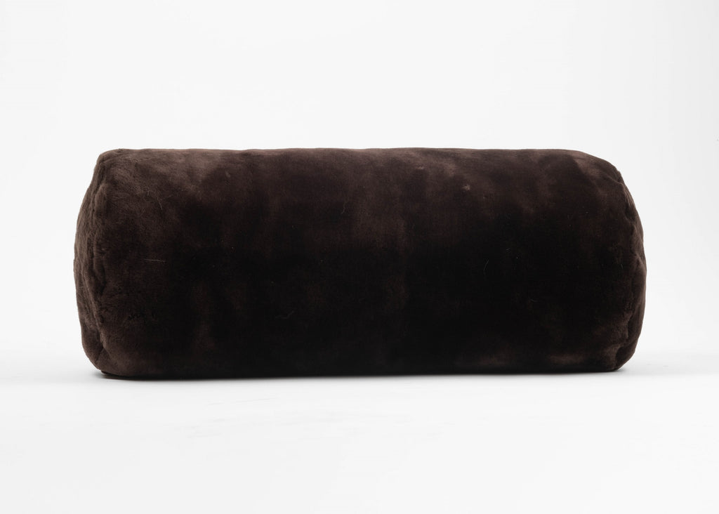Muton Shearling fur pillow in a red mahogany color