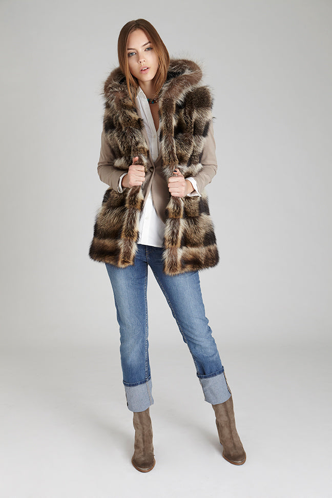 American raccoon fur hooded winter Vest in horizontal style pattern styled with jeans