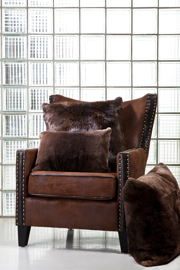 sheared beaver fur pillows and natural beaver fur pillow styled on chair
