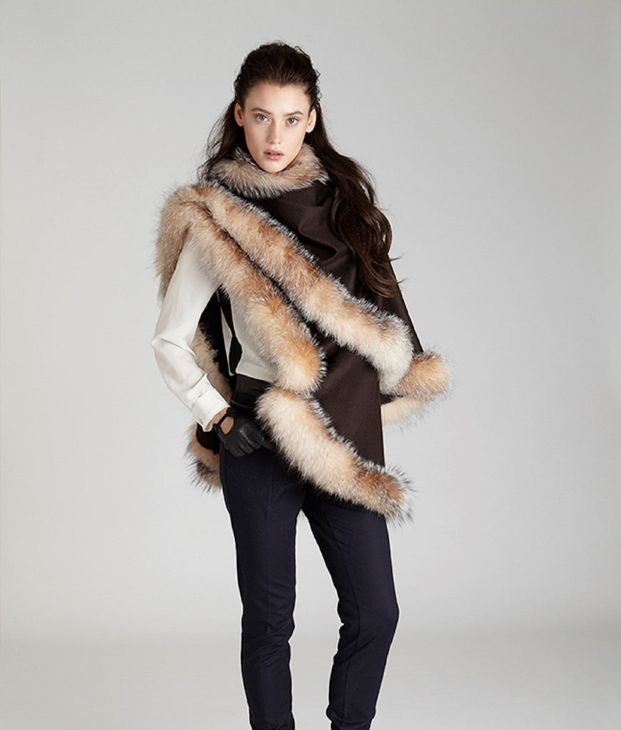 model wearing cashmere cape with crystal fox fur trim 