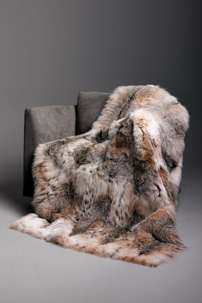 canadian lynx real fur blanket with cashmere backing draped over a living room chair throw queen king custom size