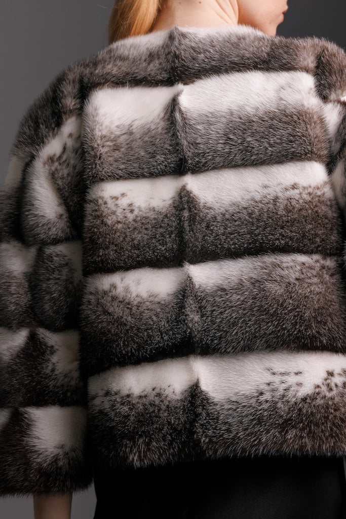 black cross mink fur jacket close up detail view of fur