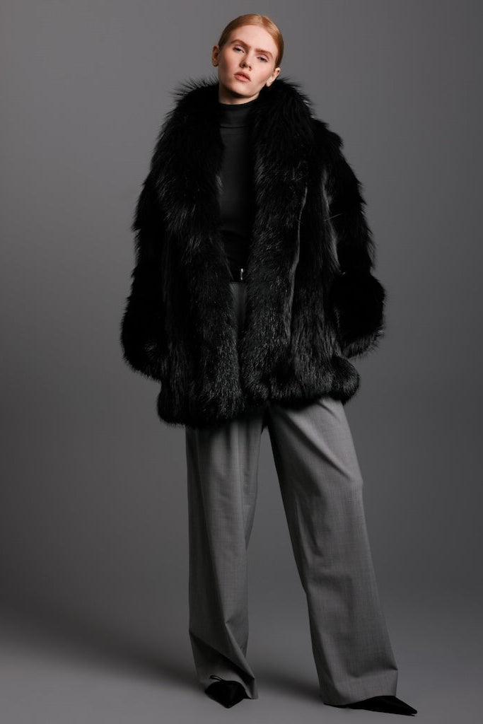 black dyed silver fox fur jacket full image on woman wearing grey pants