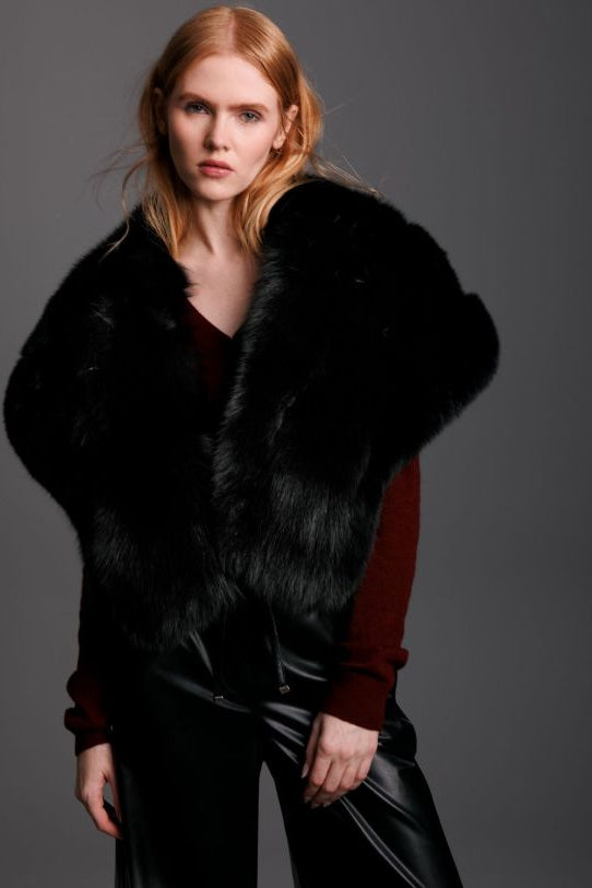 black fox real fur shrug worn on woman with black leather pants