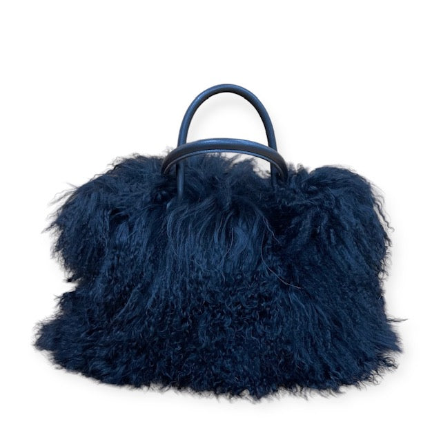 black mongolian lamb handbag with black leather handels