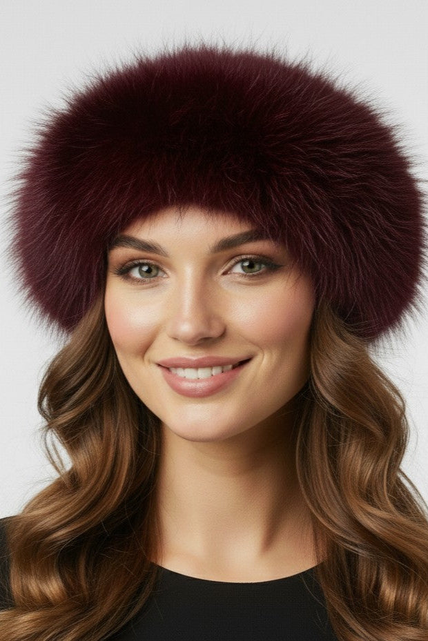 burgundy dyed fox headband on woman wearing a black sweater