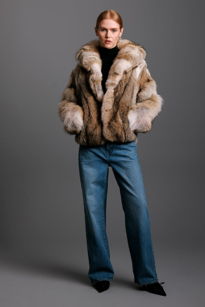 coyote fur jacket with shawl collar on woman wearing jeans