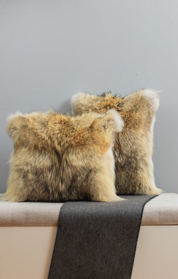 coyote fur pillow set on bench for interior design