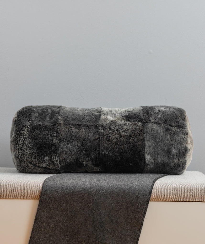 grey shearling fur pillow in bolster size designed in square pattern