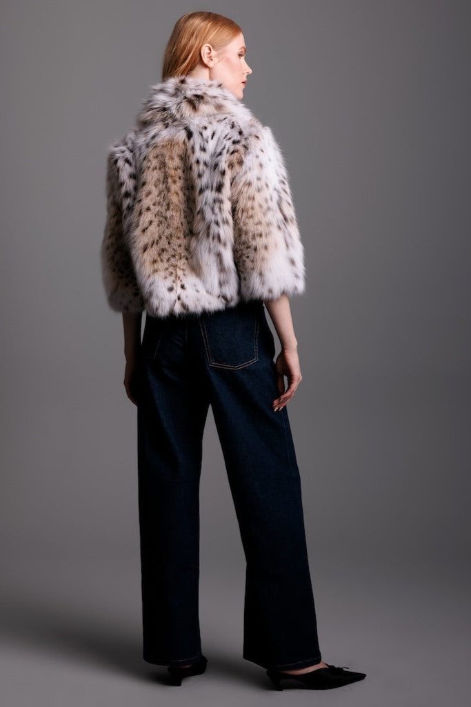 lynx bolero real fur on woman wearing all black backside detail view