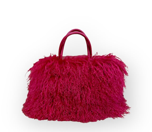dyed red mongolian lamb fur handbag with red leather handles
