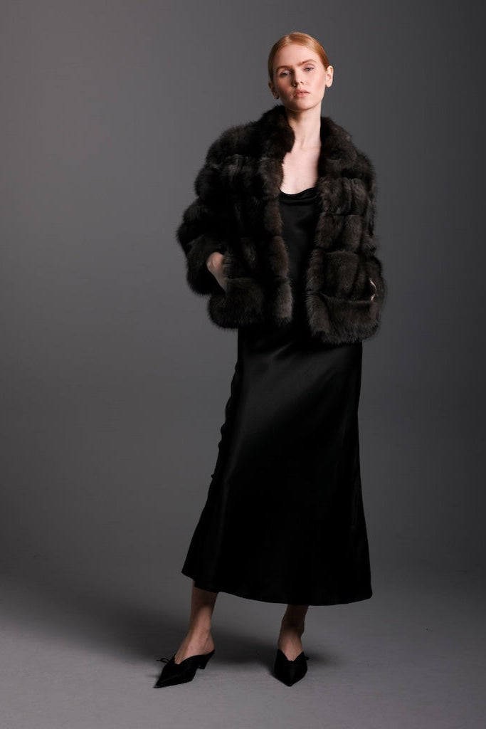 russian barguzin jacket worn on model in horizontal style over a silk evening gown