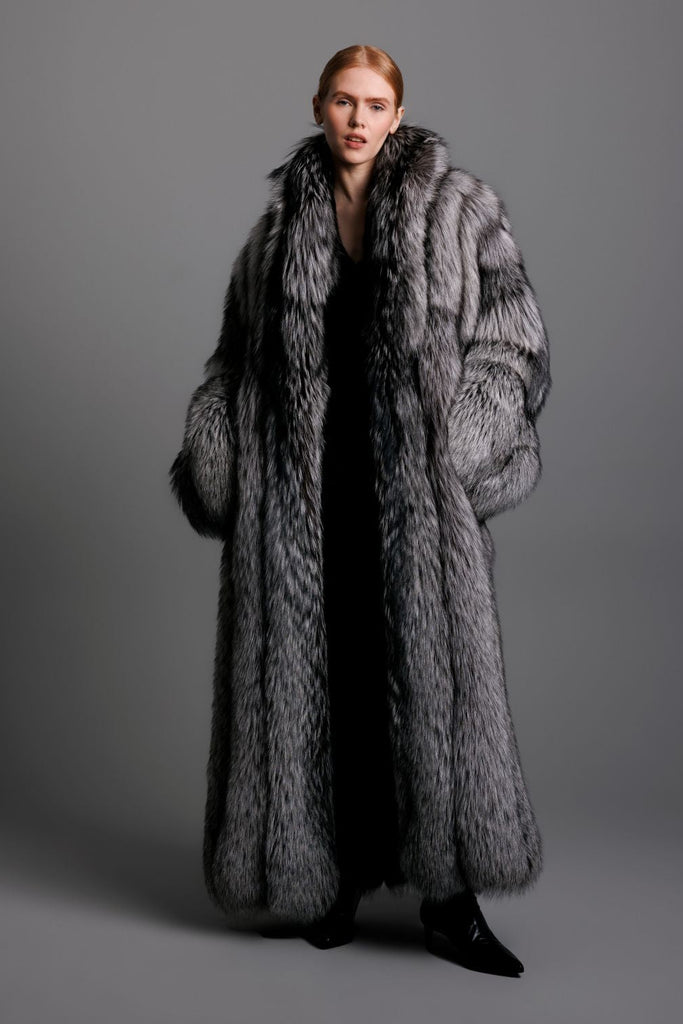 full length silver fox fur coat on woman wearing black