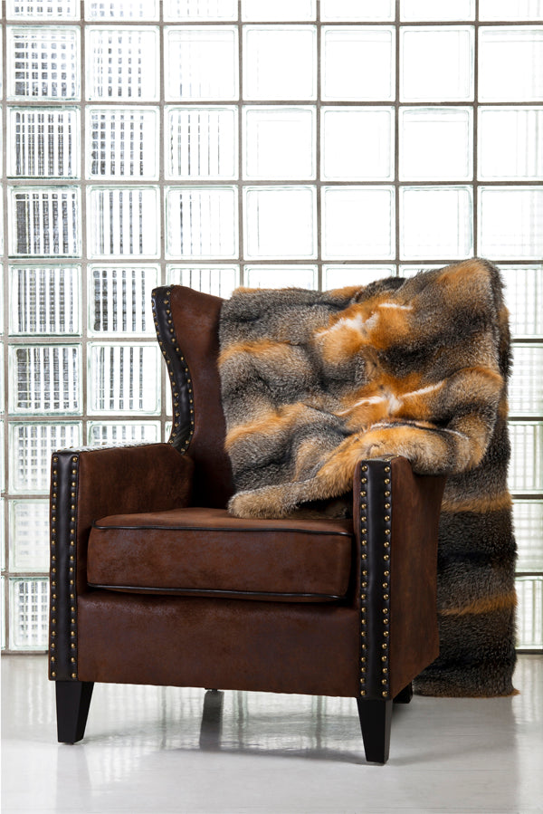 American Grey fox fur blanket draped over living room chair  for interior design