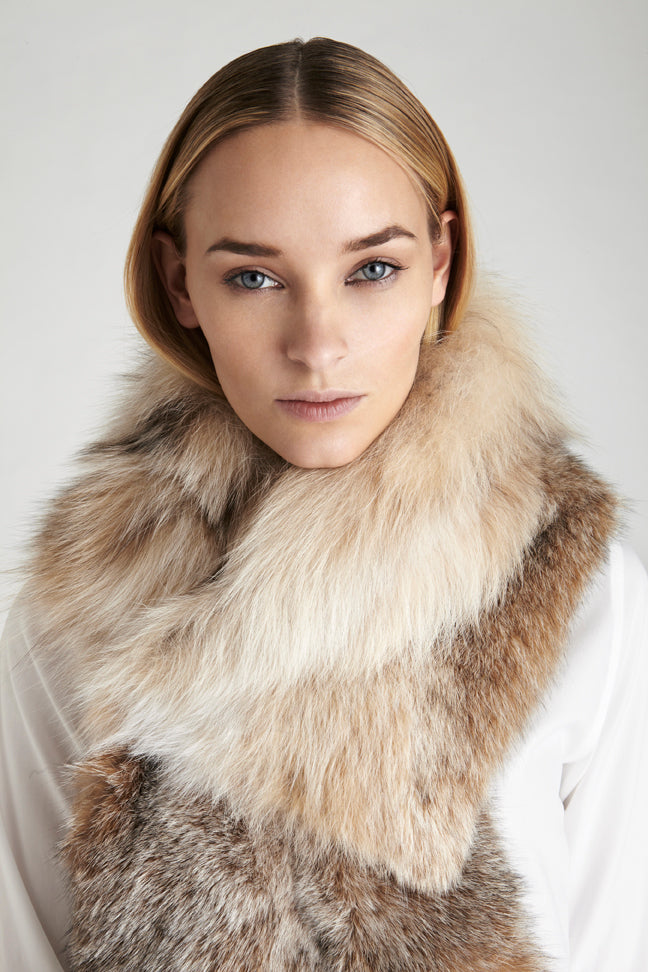 Canadian lynx fur oversized collar winter accessory worn over white blouse