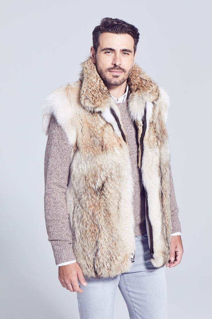 Mens coyote fur winter vest with zipper closure worn over a sweater