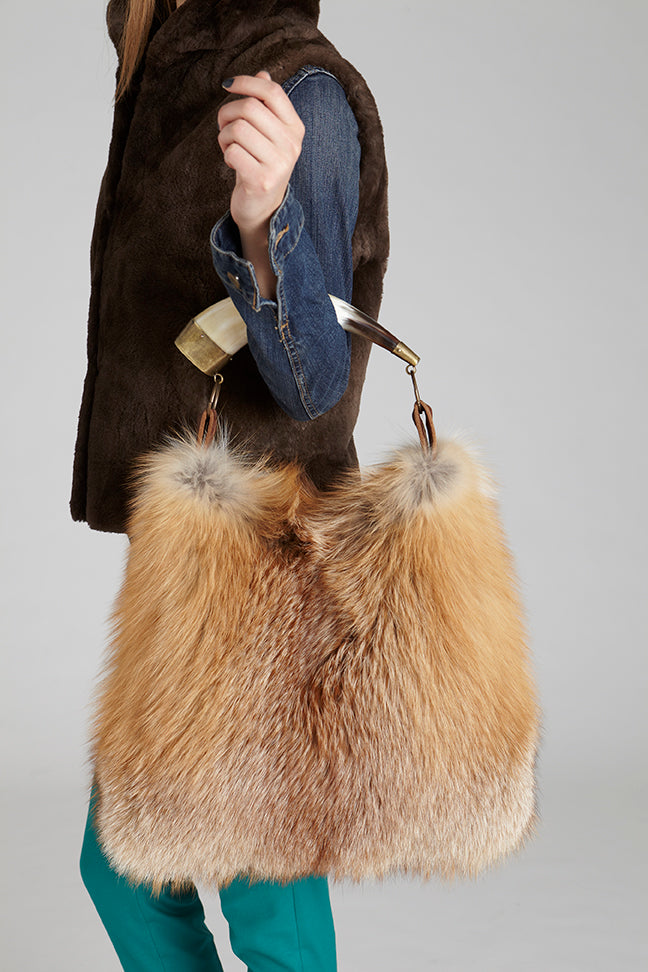 Gold Fox Fur Purse with real argentine cow horn handle on handbag Close up detail