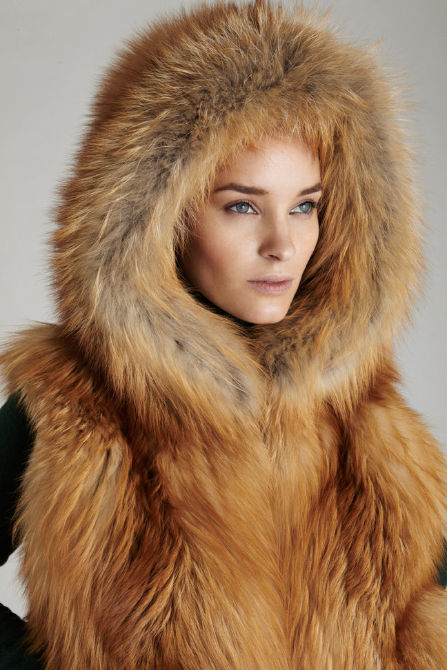 Gold Fox fur hooded short style hip length vest close up of fur hood