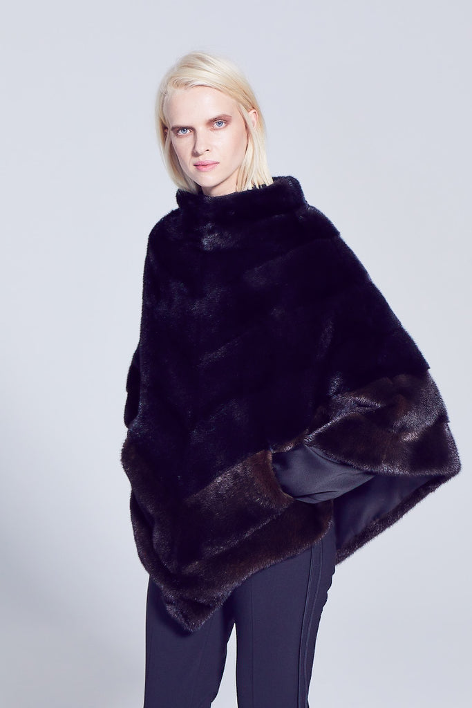 mahogny mink ranch fur poncho worn over the head with slit pockets
