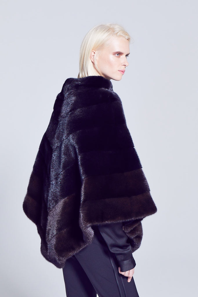 mahogny mink ranch fur poncho worn over the head with slit pockets