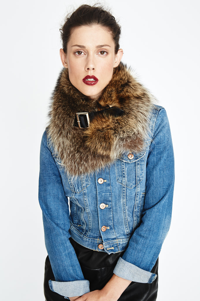 Raccoon Fur Collar with leather buckle detail worn over a denim jacket