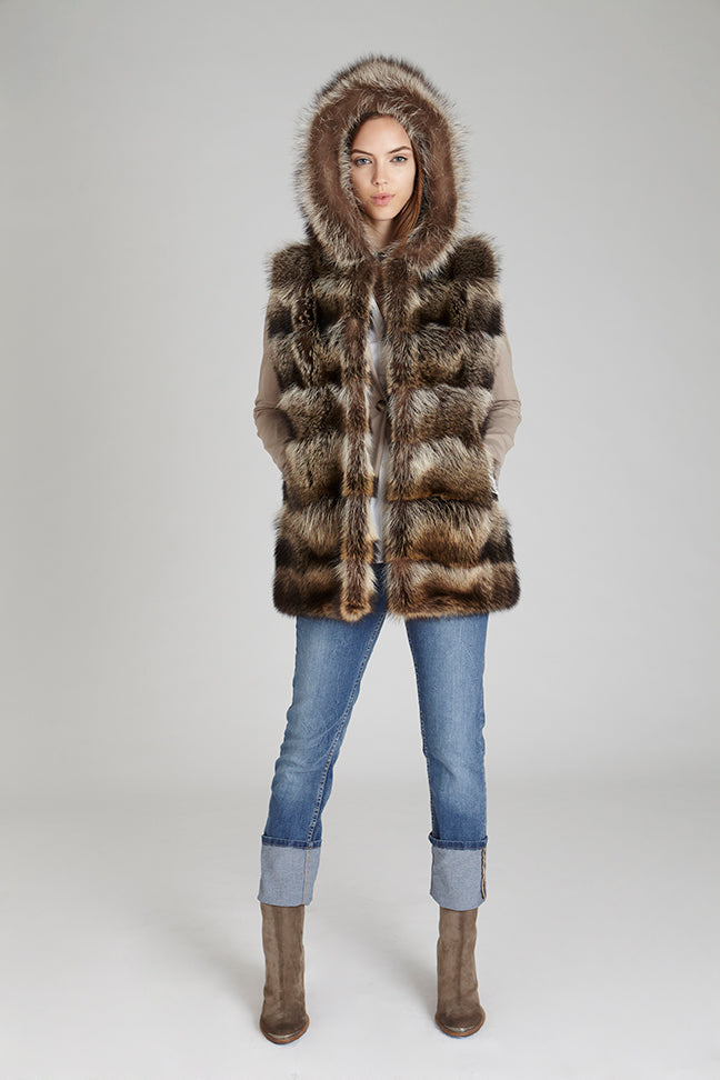 American raccoon fur hooded winter Vest in horizontal style pattern styled with jeans