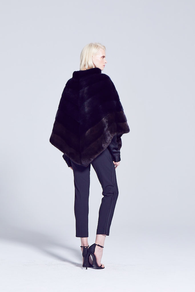 mahogny mink ranch fur poncho worn over the head with slit pockets