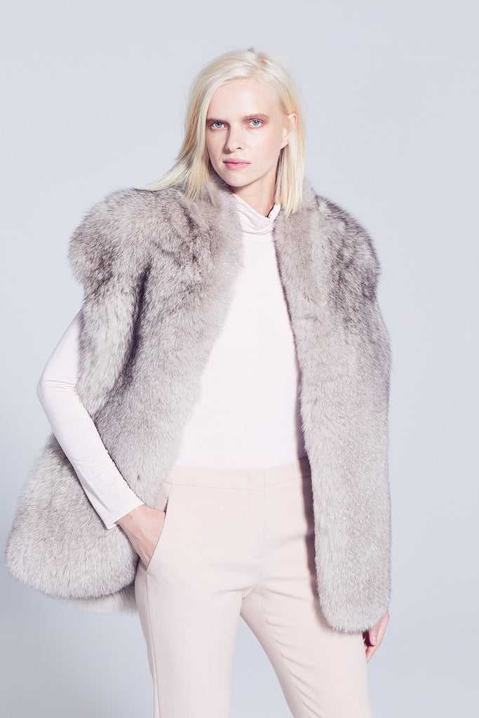 taupe dyed fur vest with slit pockets and hook and eye closure